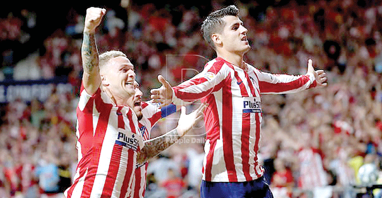 Trippier, Morata combine to give Atletico winning start