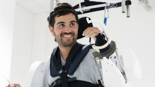 Paralysed man moves in mind-reading exoskeleton