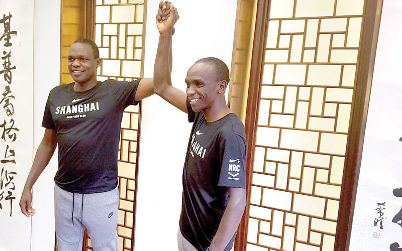 Sang: The man  who holds  Kipchoge’s hand