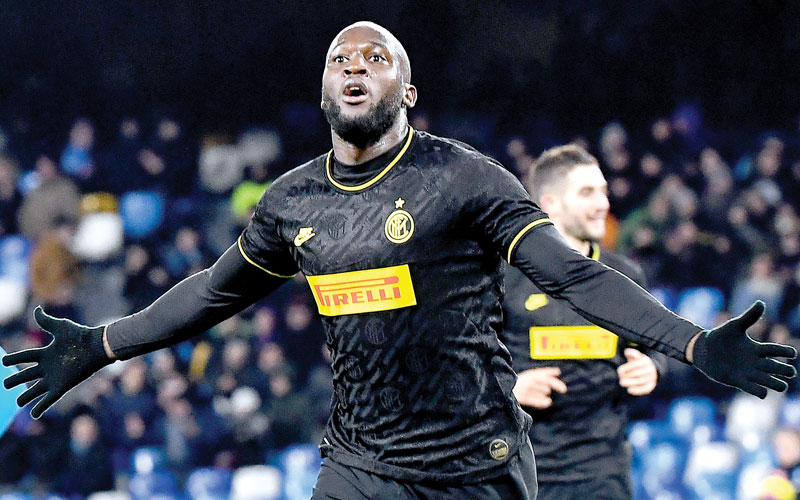 Belgian striker’s double keeps Inter top of Serie A after win against Napoli