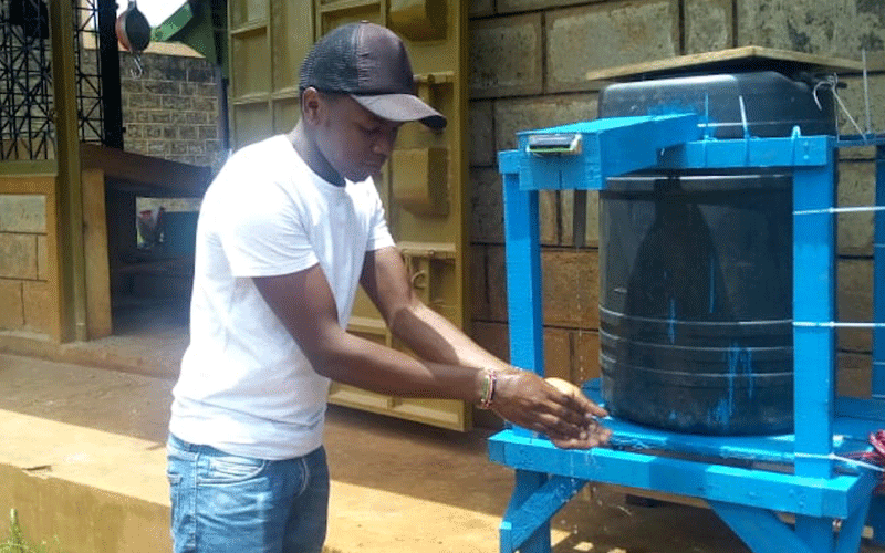 Graduate builds automated device for hand-washing