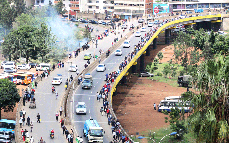 Pedestrians and motorists jostle for space along Thika Superhighway during a strike by matatu operators. PHOTO/Gerald Ithana 