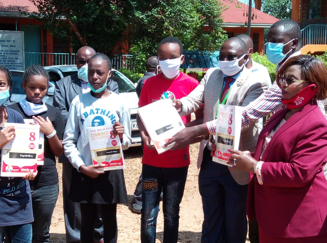 Kiharu MP gives exam revision materials to KCPE candidates