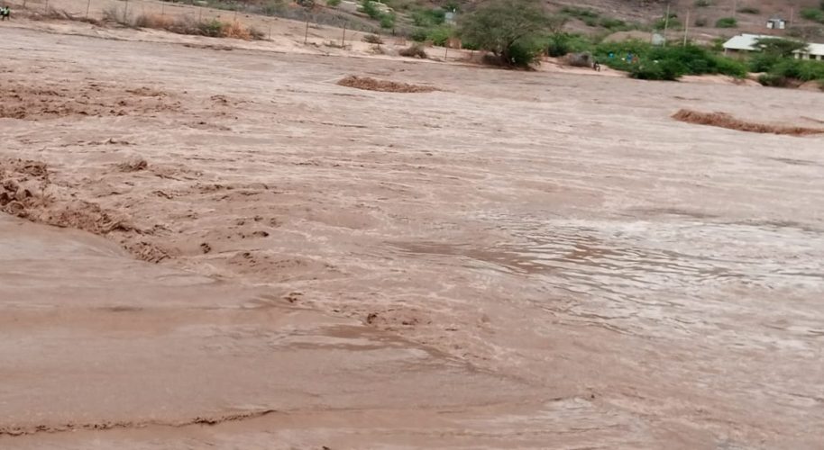 Police and a civilian drown after floods sweep their car