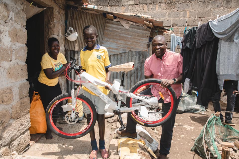 Dandora needy boy receives bicycle, scholarship from Shofco CEO
