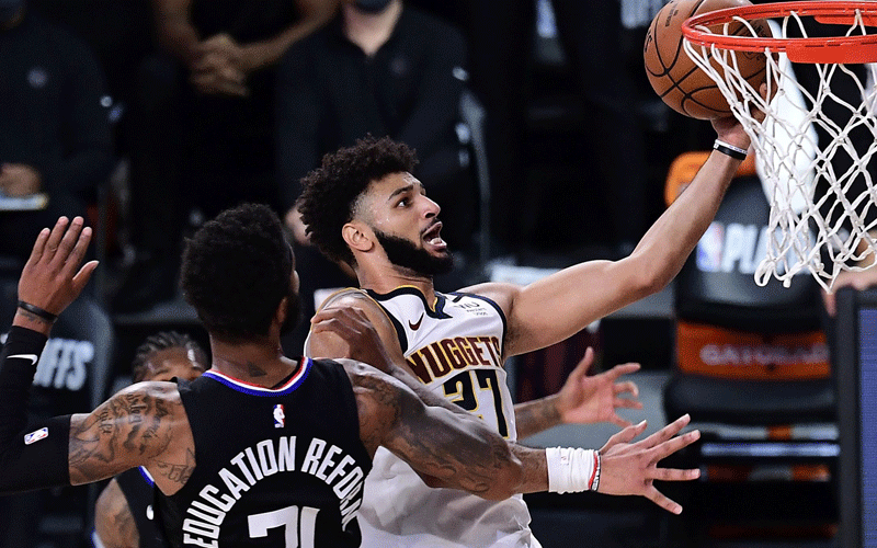 Underdog Nuggets stun Clippers in game seven, Heat edge Celtics