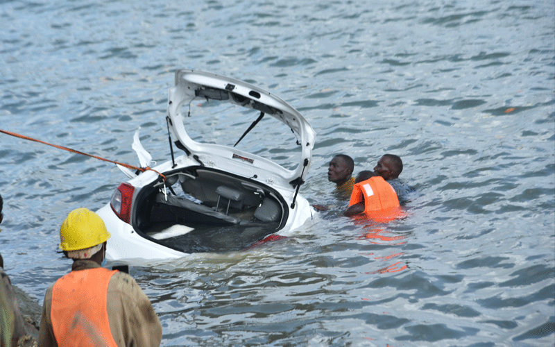 Woman dies after car plunges into ocean, son swims to safety