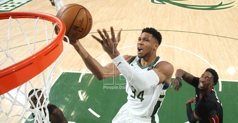 Antetokounmpo stars as Bucks score 22 three-pointers in 132-98 win against Miami
