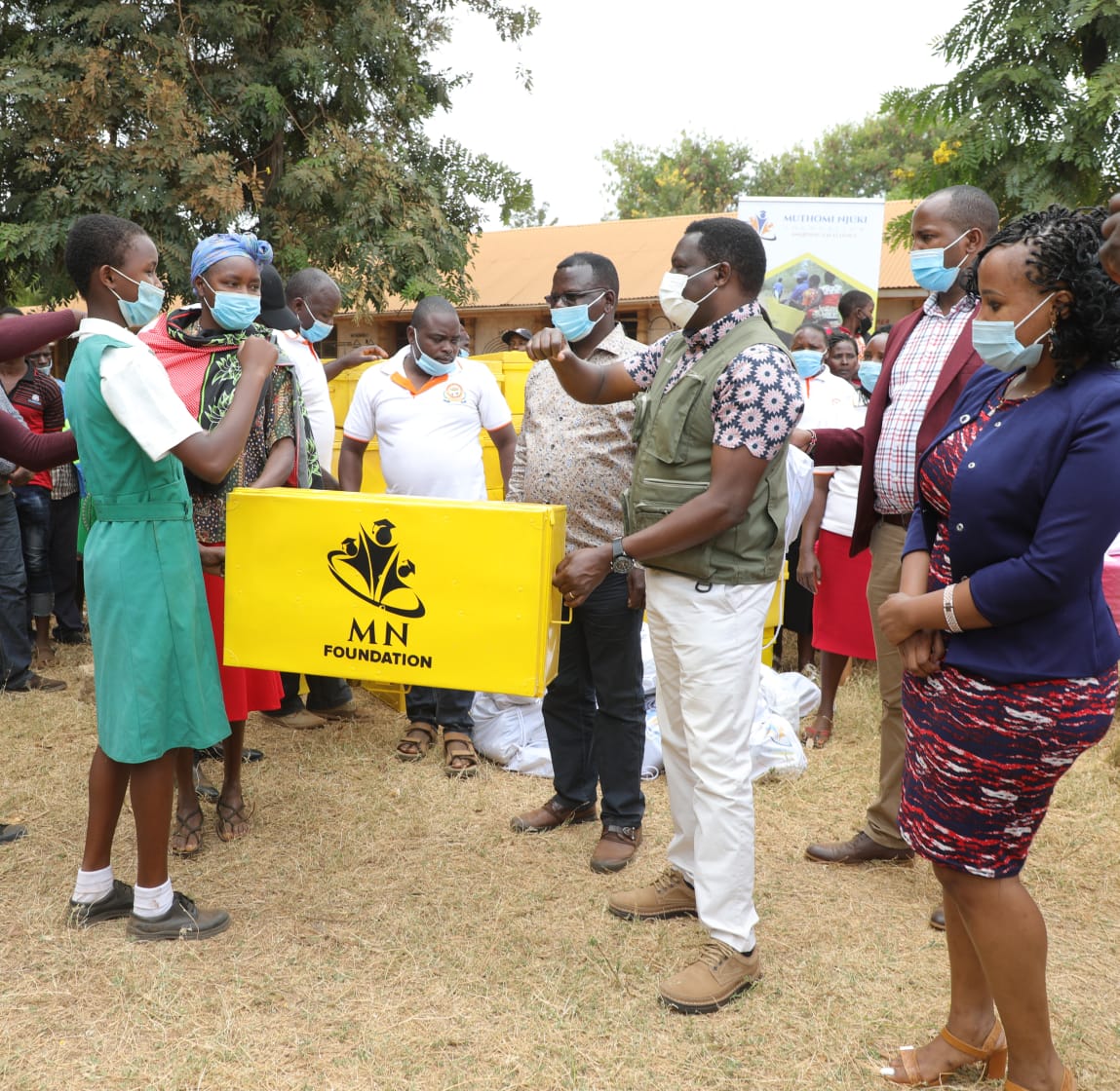 Governor Muthomi gifts form one student metal box