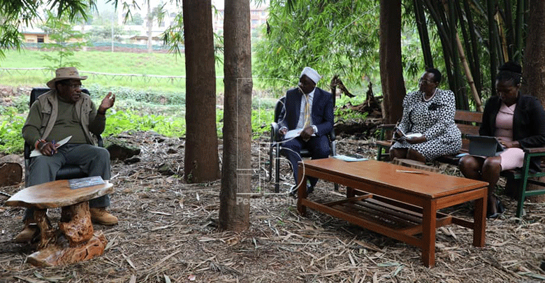 Minister who is quite at home working from park in the city