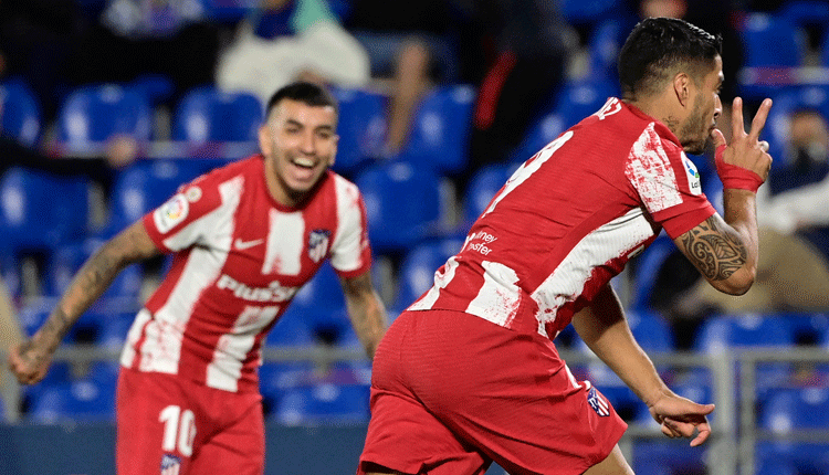 Suarez fires Atletico top with late double at Getafe