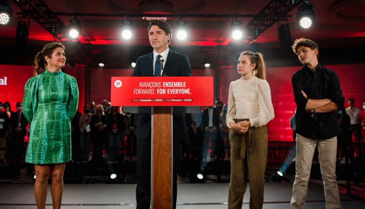 Trudeau stays in power but Liberals fall short of majority