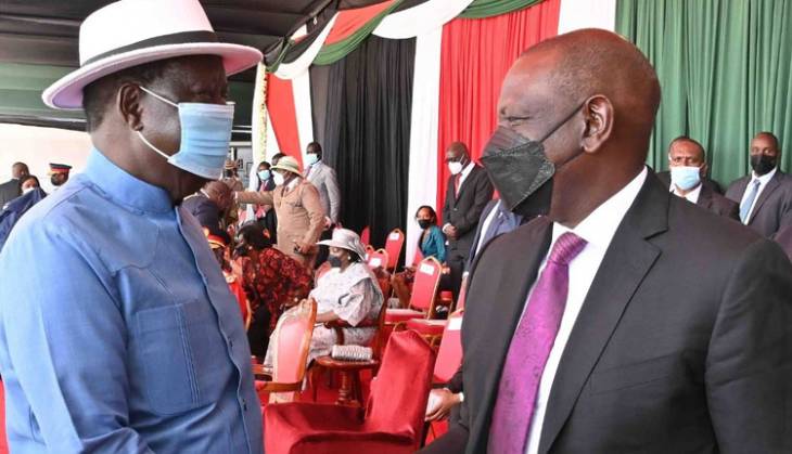 Deputy President William Ruto (right) and ODM leader Raila Odinga meet during a Jamhuri Day celebrations event at Uhuru Gardens in Nairobi. PHOTO/Courtesy