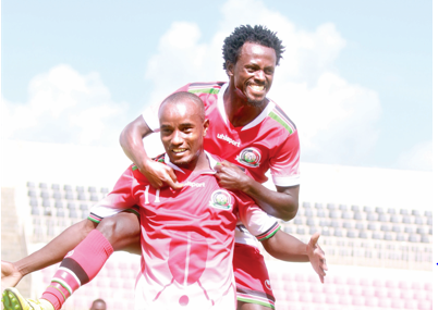 Harambee Stars forward Eric Kapaito celebrates with team-mate Kevin Kimani during a past international match. PD/ DAVID NDOLO