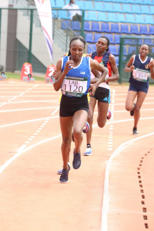 Hellen Obiri (right) leads in the 5,000m while Kibiwott Kandie from Embakasi Garrison leads in the 10km men’s finals during Kenya Defence Forces Athletics trials at Lang’ata Barracks. PHOTO/David Ndolo