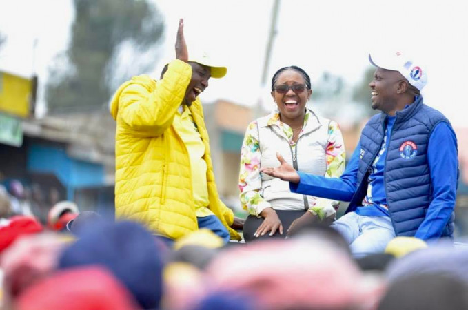 Bahati MP Kimani Ngunjiri, Nakuru Senator Susan Kihika and Gatundu South MP Moses Kuria share a light moment during Kenya Kwanza campaigns