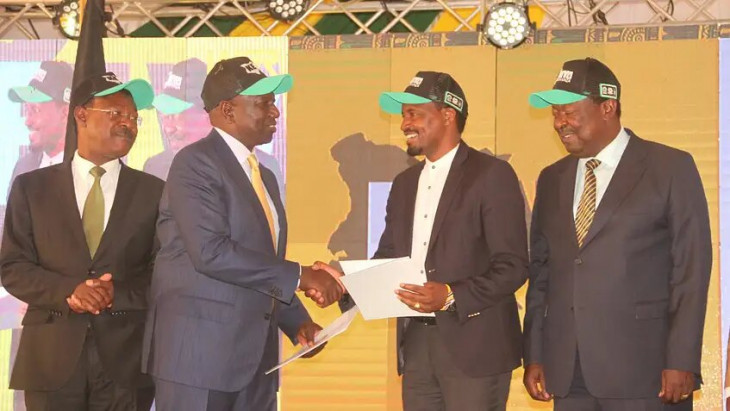 TSP leader Mwangi Kiunjuri shakes hands with DP William Ruto after signing a pact to join Kenya Kwanza alliance on April 12, 2022. PHOTO/Courtesy