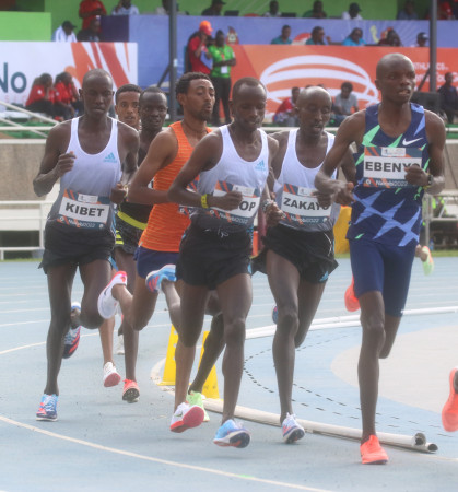Daniel Ebenyo Simiyu (right) in the lead of 5000m men’s race during Kip Keino Classic last month. PD/DAVID NDOLO