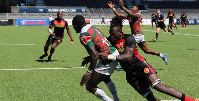 Collins Injera offloading a pass against Uganda. 
PHOTO/Kenya Simbas/Facebook