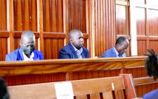 Migori Governor Okoth Obado (right), his co-accused Casper Obiero (left) and Michael Oyamo at Milimani Law Courts during the hearing of the Sharon Otieno murder case yesterday. PHOTO/ CHARLES MATHAI