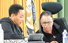 Chief Justice Martha Koome (right) consults her Deputy, Philomena Mwil. PHOTO/Charles Mathai