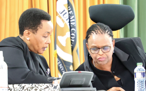 Chief Justice Martha Koome (right) consults her Deputy, Philomena Mwil. PHOTO/Charles Mathai