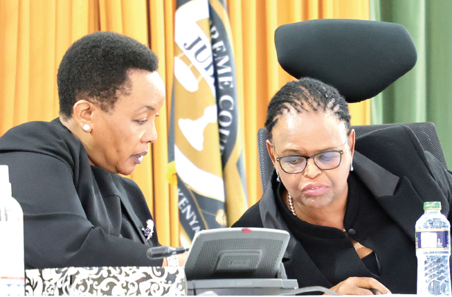 Chief Justice Martha Koome (right) consults  her Deputy, Philomena Mwilu, yesterday. PD/CHARLES MATHAI