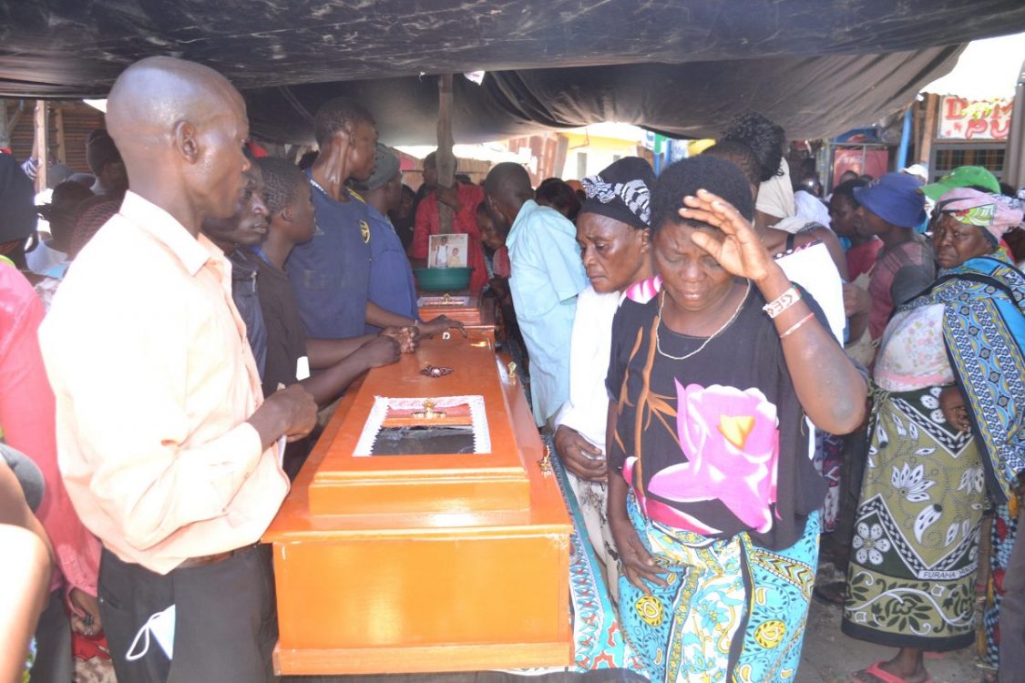 Emotions run high as brothers  killed by father are laid to rest