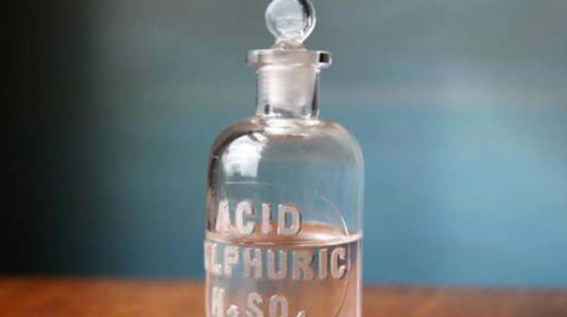 Police hold man after boy drinks acid