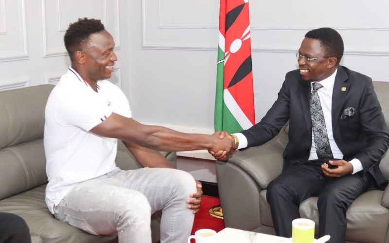 Sports CS Ababu Namwamba and footballer Victor Wanyama. PHOTO/Courtesy.