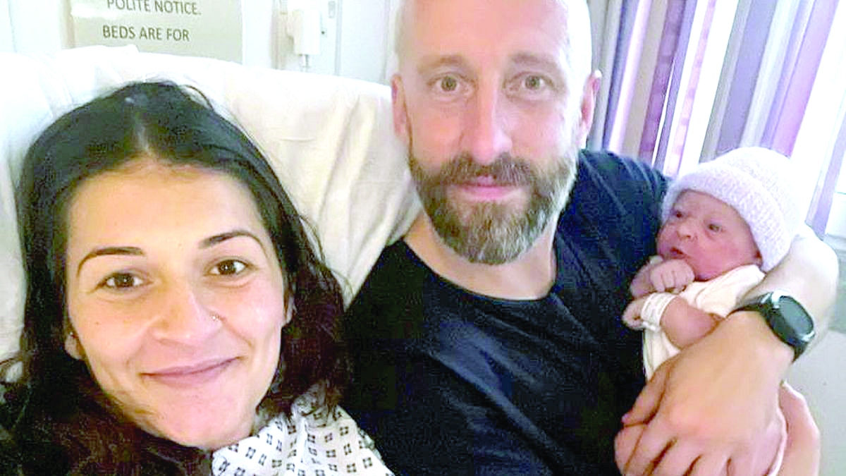 Baby arrives two weeks late… on parents’ birthday
