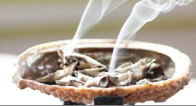 Burning sage to cleanse ill energy 