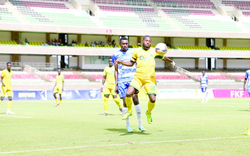 Khalid Jumaan of Mathare United controls an aerial ball under pressure from Victor Omune of AFC Leopards during their FKF-PL match played at the Kasarani Stadium. PHOTO/Rodgers Ndegwa 