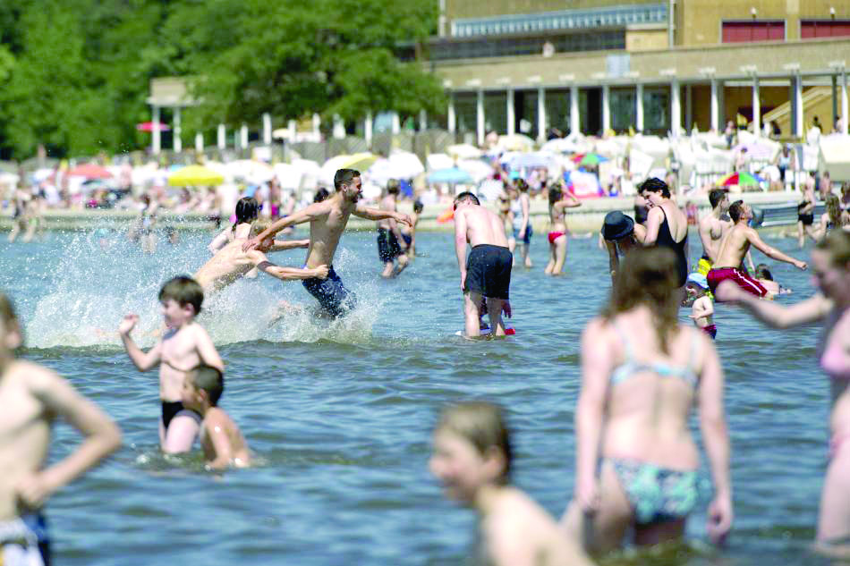 Women allowed to go topless in swimming pools