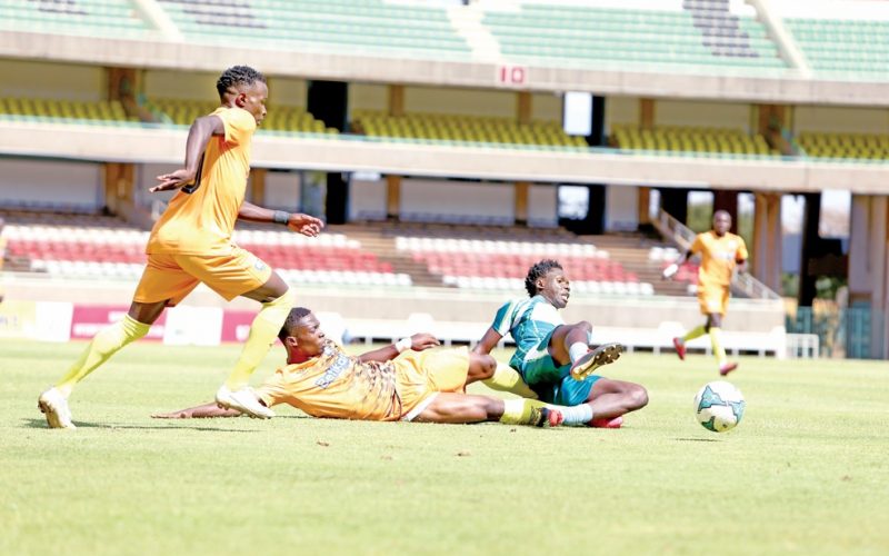 Kevin Okumu of KCB FC (R) is fouled by AFC Leopards duo of Jafari Owiti (below) and Cliff Nyakeya during their FKF-PL match at the Kasarani Stadium, Nairobi on February 26 2023. PHOTO/ RODGERS NDEGWA