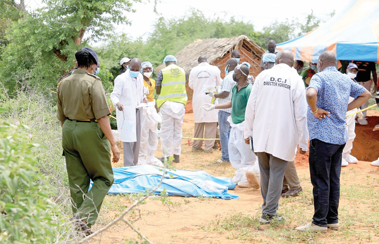 Detectives from homicide unit, DCI and other security personnel marking graves site in Shakahola to exhumed bodies. PD/RONALD MWANZOMBO