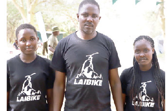 Father, daughters share passion for biking and awards