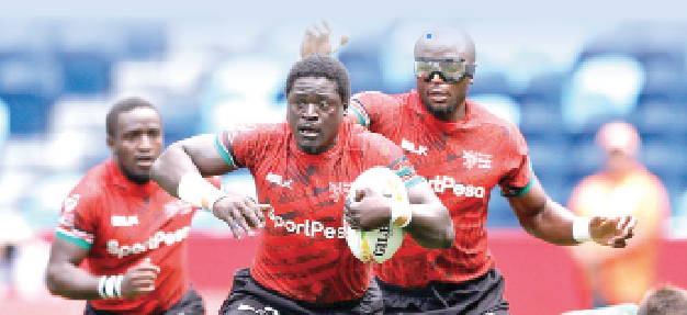 Kenya 7s Alvin ‘Buffa’ Otieno (with ball) breaks during a past international match against South Africa. PHOTO/World Rugby