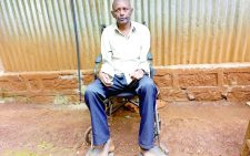 Thomas Ngure sitting on a wheelchair chair at their home in Gatundu Kahuro Murang'a. PHOTO/Wangari Njuguna