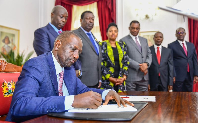 President William Ruto signing Finance Bill into law.