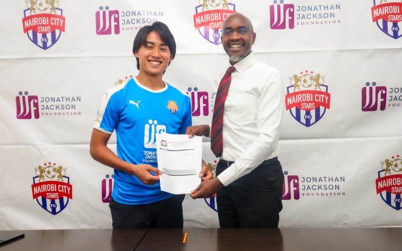 Yuto Kusaba possess for a photo with Nairobi City Stars CEO Patrick Korir. PHOTO/City Stars