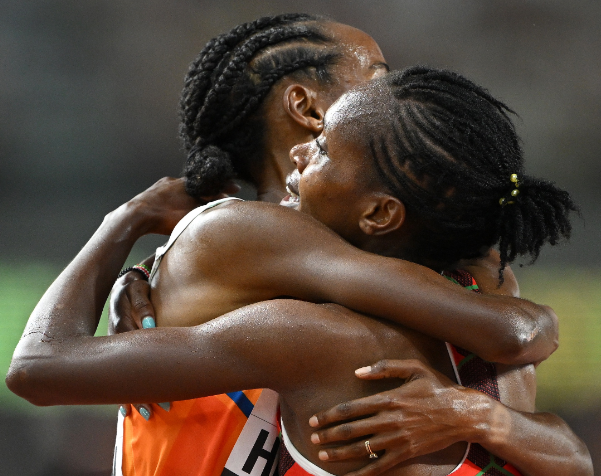 Faith Kipyegon and Sifan Hassan after competing in 5000m race final in Budapest. PHOTO/(@WorldAthletics)/World Athletics/Twitter