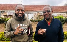 Former Chief Justice Willy Mutunga (right) and rights activist Boniface Mwangi enjoy coffee while strolling around the city. PHOTO/Boniface Mwangi(@bonifacemwangi)/Twitter