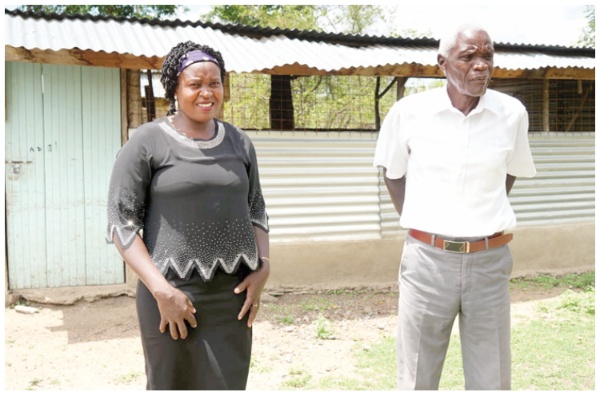 Lilian Akinyi and her father, Benson Ochola at their home in Siaya County where she has been living since 2020 after walking away from her abusive marriage and controlling husband. PHOTO/Viola Kosome