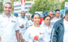 Actor Alfred Munyua (left) leads other creatives in the "Power of Humanity Walk" in Machakos County recently.