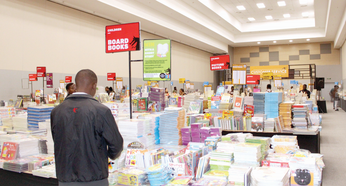 A book lover peruses books at a past fair. PHOTO/Muthoki Kithanze