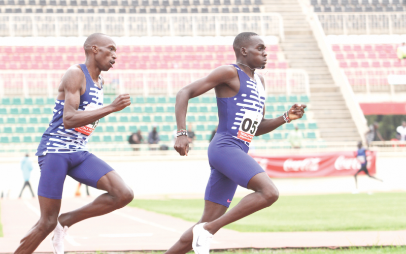 Reynold Kipkorir Cheruiyot (right) leads Timothy Cheruiyot during the national trials to pick team Kenya in June. PHOTO/Philip Kamakya