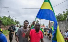 People celebrate in a street in Port-Gentil, Gabon, on August 30, 2023, in support of the military takeover. PHOTO/AL Jazeera