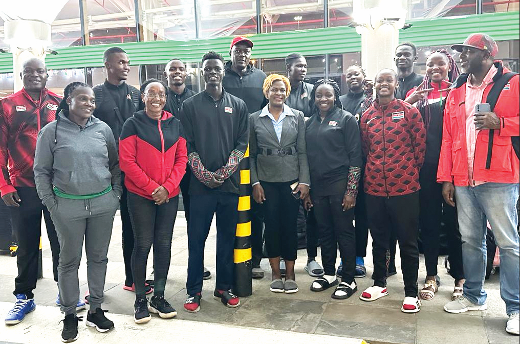 Under 23 3X3 national basketball team players pose for a photo, at the JKIA, before departing for World Cup in Poland. PHOTO/KBF.