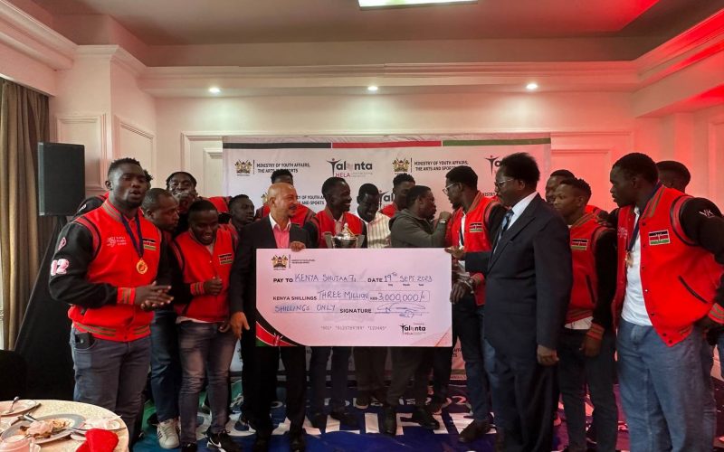 Sports CS Ababu Namwamba with Kenya 7s team. PHOTO/(@OfficialKRU)/Kenya Rugby Union/X